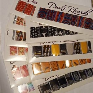 Pack of 12 Dusti Rhoads nail strips.